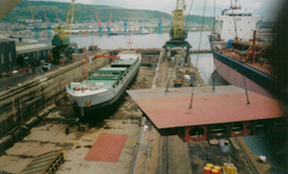 An oil tanker on the right and the Union Titan on the left